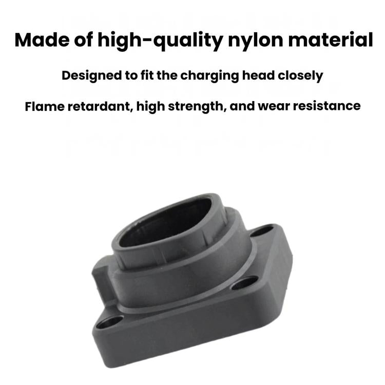 Gray nylon charging connector dock with raised rim and circular opening for insertion.