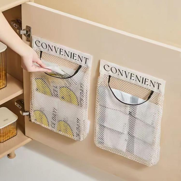 Mesh grocery bag holder, two detachable wall mounts, beige net with black handle trim.