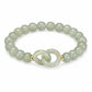 Green jade-style beaded bracelet with interlocking double loop charm and gold spacers