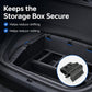 Black securing clips holding a car storage box securely in place