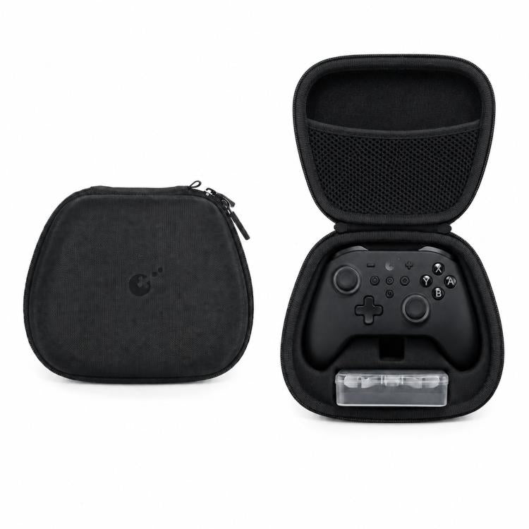 Hard-shell controller carrying case with open lid, mesh pocket, and zipper closure