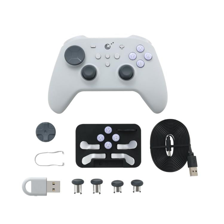 Grey wireless game controller with adjustable joysticks, ABXY buttons, and accessory set