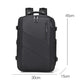 Black business backpack with front zipper, top handle, and padded adjustable shoulder straps