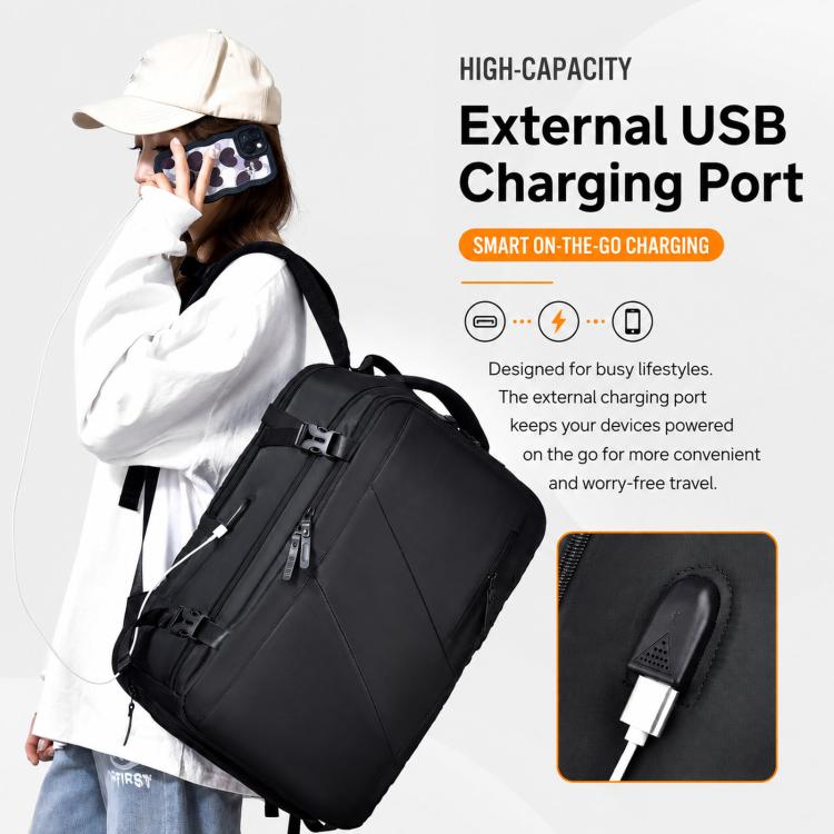Black business backpack on person, with visible charging cable inset detail