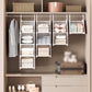 Stackable white plastic hanging closet organizer set with multiple baskets and hooks