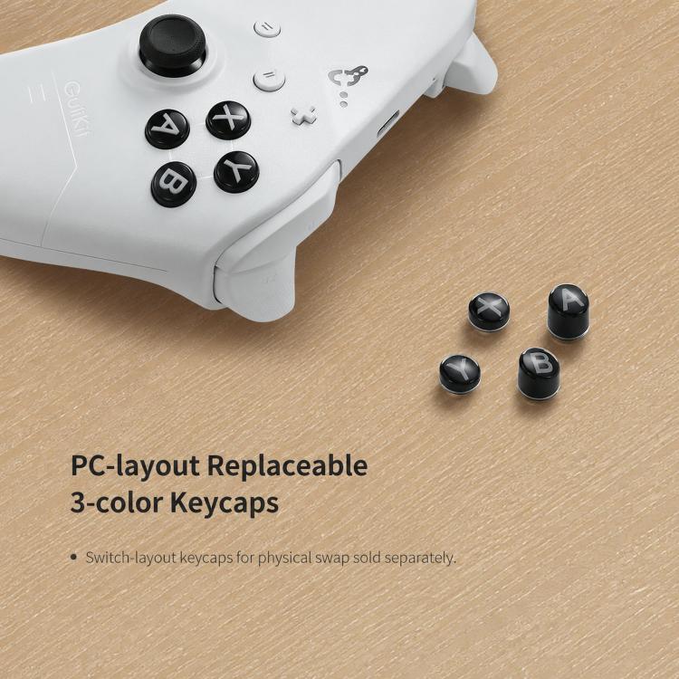 White controller with face buttons and PC layout replaceable 3-color keycaps