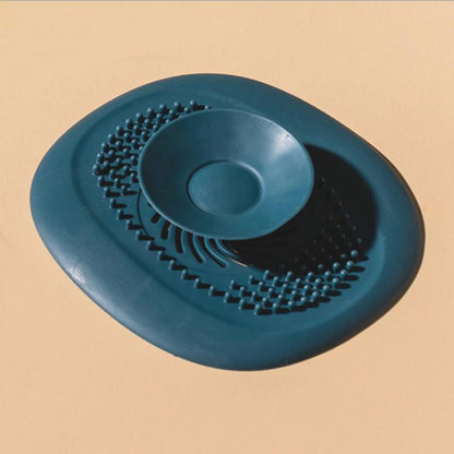 Teal silicone push-button drain cover hair strainer with raised filter dots