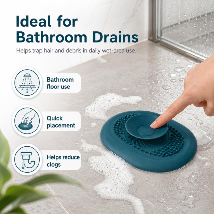 Teal bathroom drain hair strainer with center cap, pressed by hand