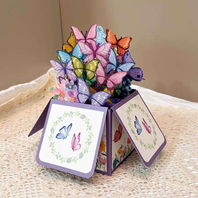 3D pop-up butterfly greeting card with purple box, two side flaps open, butterfly art