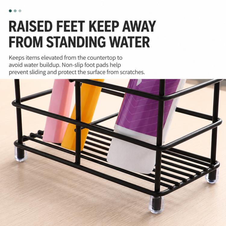 Black toothbrush holder rack with raised feet and slotted ribbed base