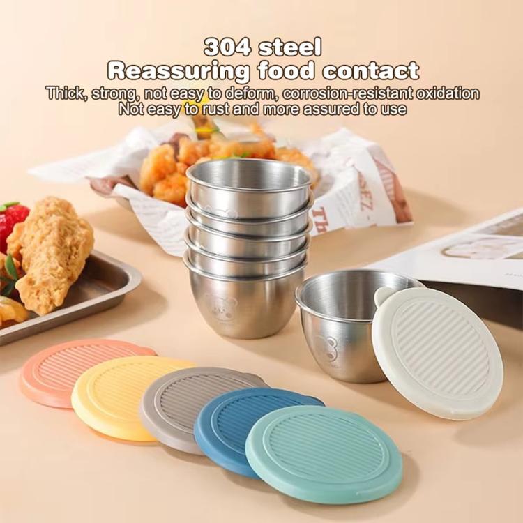 Stacked 304 stainless steel sauce cups with snap-on lids, assorted colors