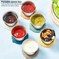 Portable mini sauce containers with lids holding colorful dipping sauces