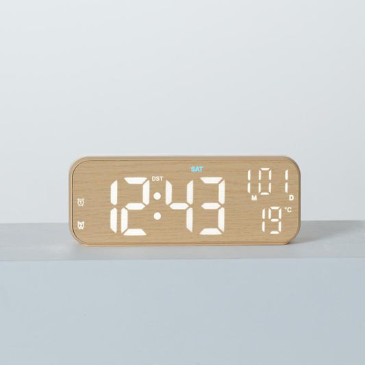 Yellow wood grain LED digital desk clock showing time, day, and temperature with blue glow