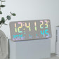 Gray fabric digital wall clock with multi-color LED time, temperature, and humidity display.