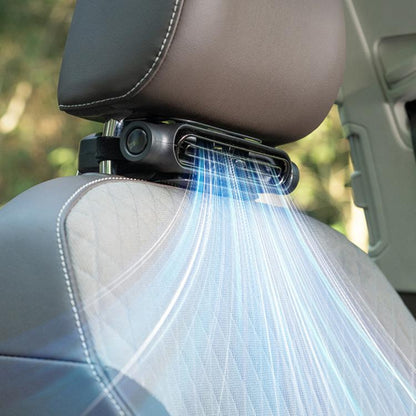 Black car seat cooling fan with USB power, mounted on headrest, airflow visible