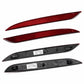 Red lens fog light reflector pair with black mounting housings and light openings