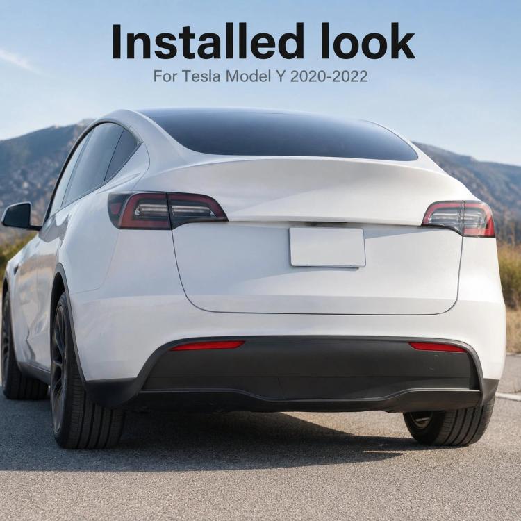 Installed Tesla Model Y rear bumper fog light reflectors with red lenses