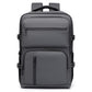 Men's dark gray minimalist laptop backpack with front zip panel and padded shoulder straps