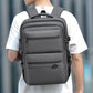 Gray waterproof laptop backpack with front zip pockets and adjustable shoulder straps