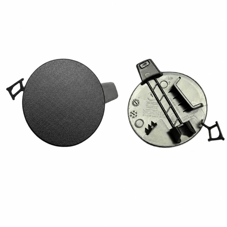 Rear bumper tow hook cover with textured face and underside clip mounting parts