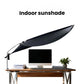 Indoor sunshade curtain in dark color on tabletop, supported by telescopic pole and clamp