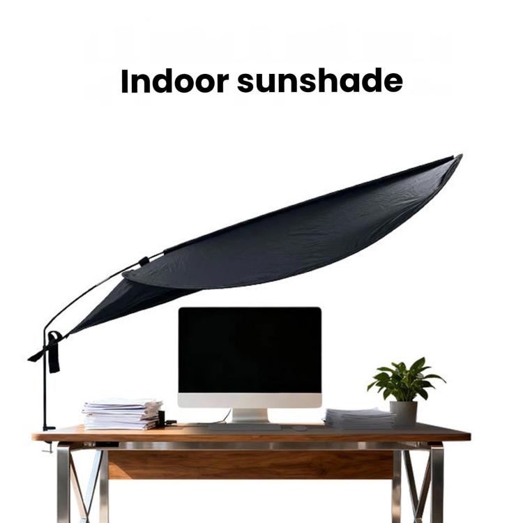 Indoor sunshade curtain in dark color on tabletop, supported by telescopic pole and clamp
