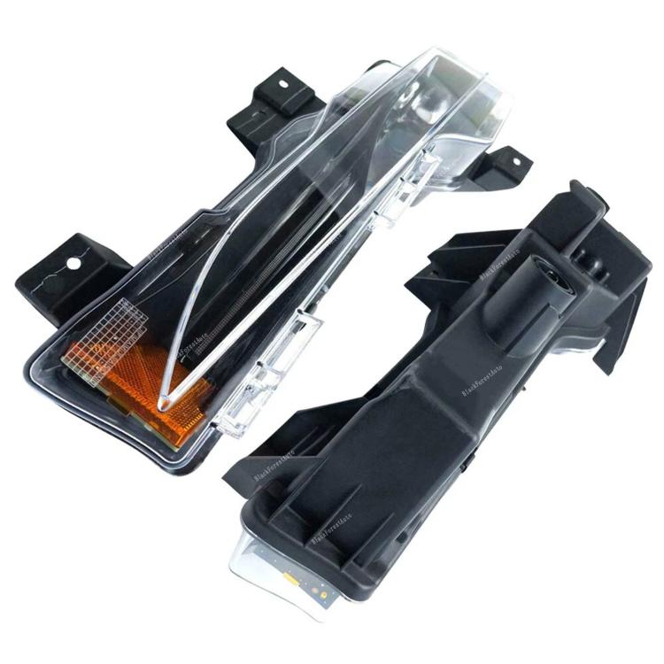 Front fog light DRL assembly with clear lens, amber reflector, and black mounting base