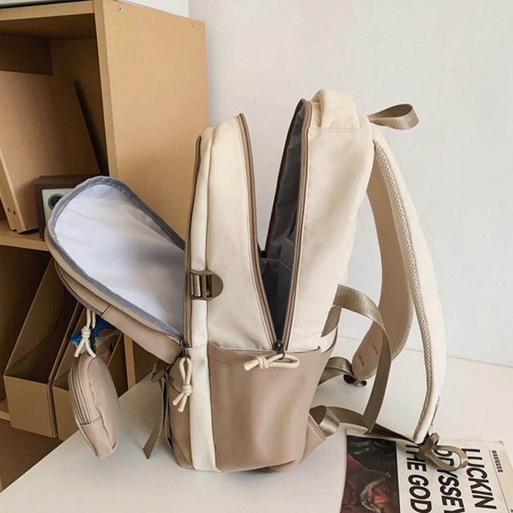 Beige school backpack with dual compartments and front detachable coin pouch
