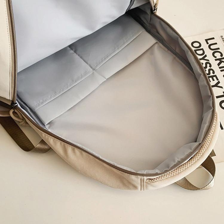 Opened school backpack showing padded interior compartments