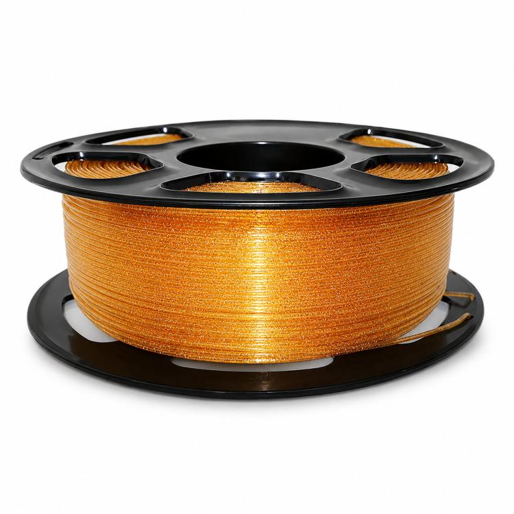 Orange glitter PETG filament on black spool reel, fine metallic sparkle wound tight
