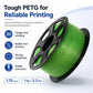 Green glitter PETG filament spool for 3D printing, wound on black reel