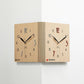 Woodgrain brown dual-sided corner wall clock with black hands and numbers on two faces