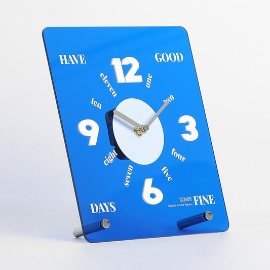 Blue mirror-finish acrylic desk clock with raised numerals and silent non-ticking quartz movement