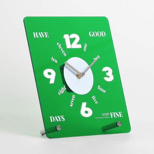 Green mirror-finish acrylic desk clock with raised numerals and silent non-ticking quartz movement