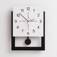 Cream wall clock with minimalist dial, black markers, and brown-accent minute hands