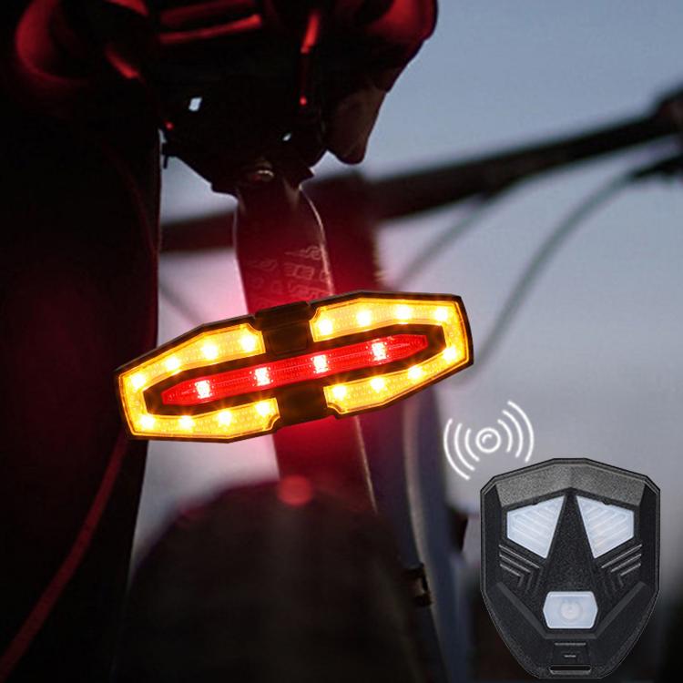 Bicycle remote warning tail light with turn signals, glowing red and yellow with remote control