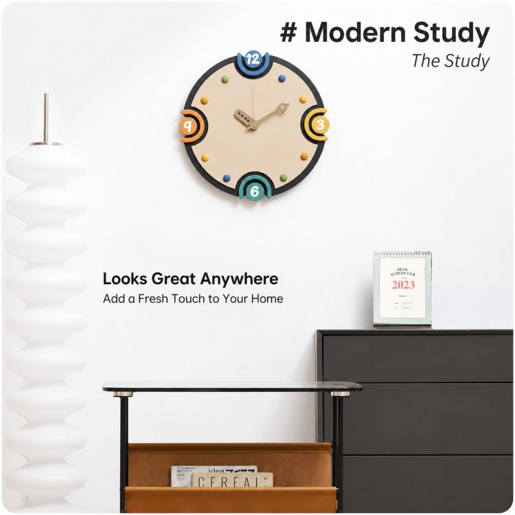 Modern orange-rim wall clock with cream dial, colorful number markers, and twin hands