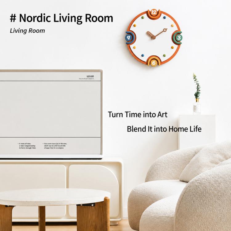 Modern orange-rim wall clock with cream dial, colorful numbers, and metal hands