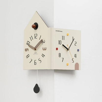 Cream double-faced corner wall clock, house shape with brown knob and colored minute marks