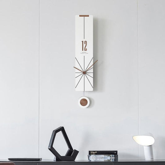 White minimalist wall clock with radial-line dial, slim hands, and round pendulum weight