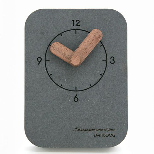 Small silent desk clock with gray case, round dial, wooden hour and minute hands