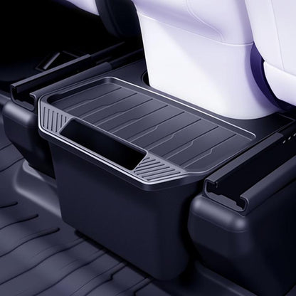 Rear seat storage box with ribbed tray and open top, dark gray