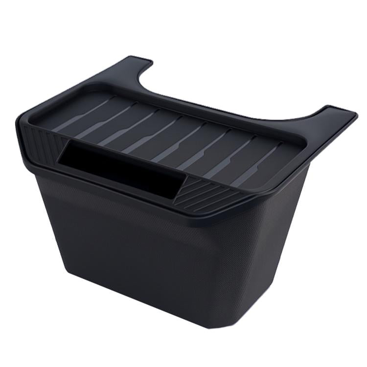 Rear seat storage box with curved open top and ribbed base, dark gray