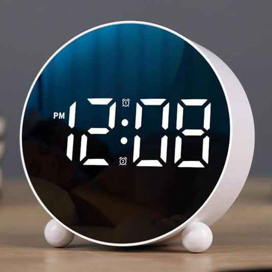 Circular LED alarm clock, black frame with blue LED time display and dual alarm icons