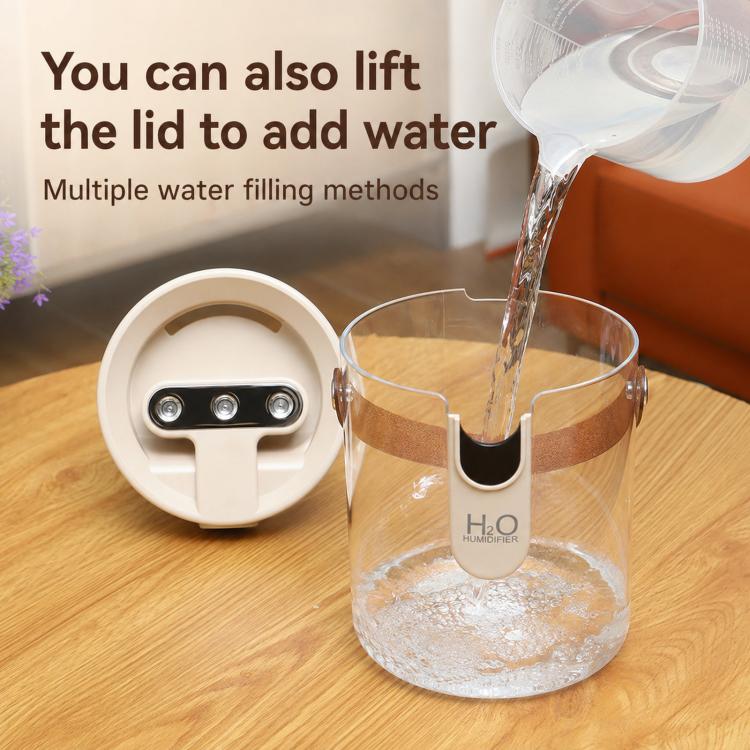Beige 1.5L humidifier with open lid and removable water tank filled with water