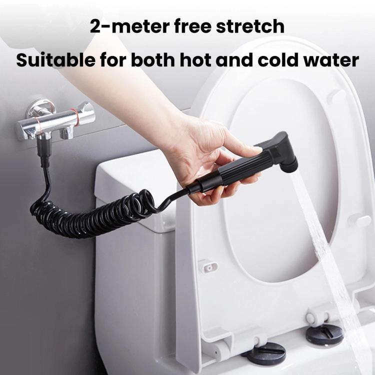 Black toilet sprayer with 2-meter stretch hose attached to toilet