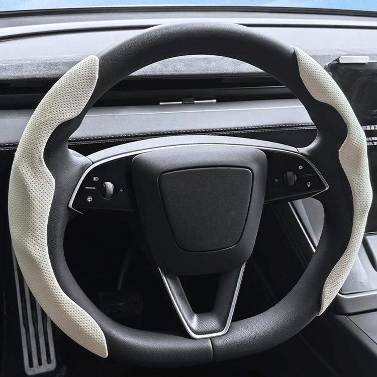 Light gray suede steering wheel cover with stitched rim edge