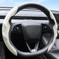 Steering wheel cover with light beige outer grip and dark center insert