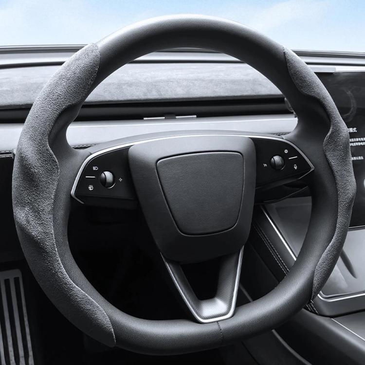 Gray steering wheel cover with textured grip and center control cutout
