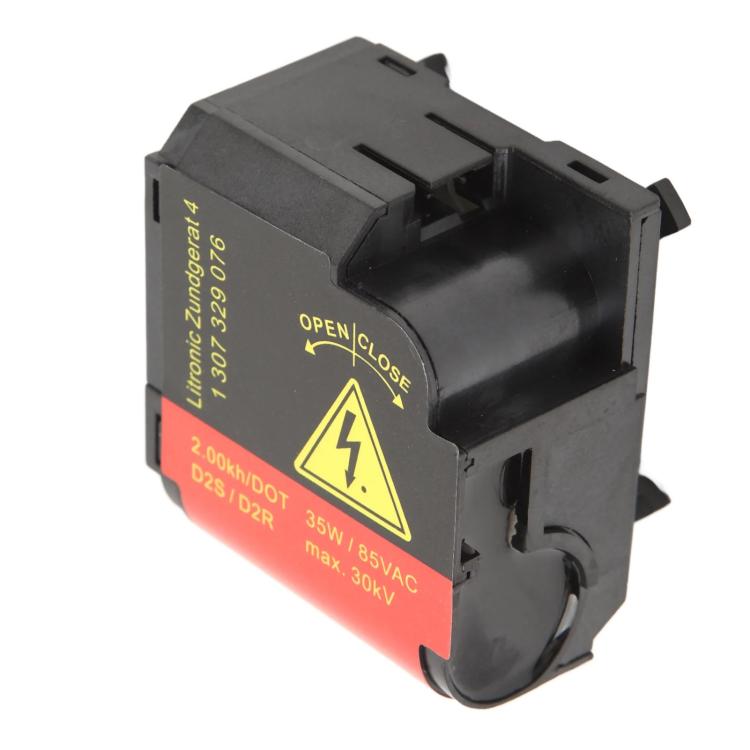 High-voltage headlight igniter module, angled side view with OPEN/CLOSE and red label